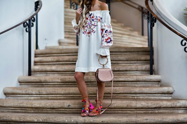 fashion blogger mia mia mine wearing elina linardaki pom pom sandals from shopbop and a chloe nile bag from net-a-porter