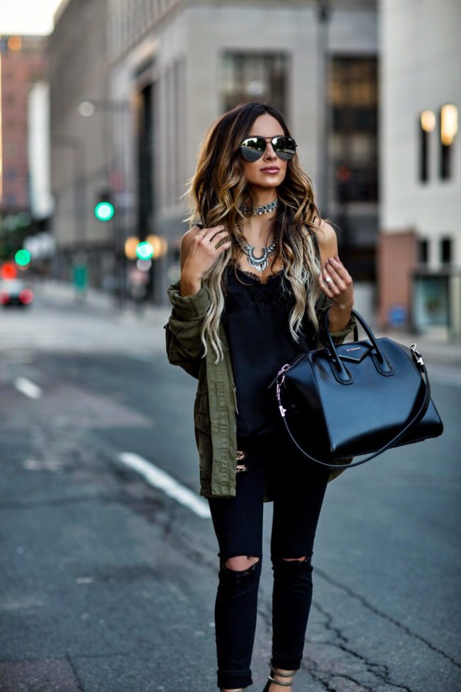 fashion blogger mia mia mine wearing layered baublebar statement necklaces and a givenchy bag