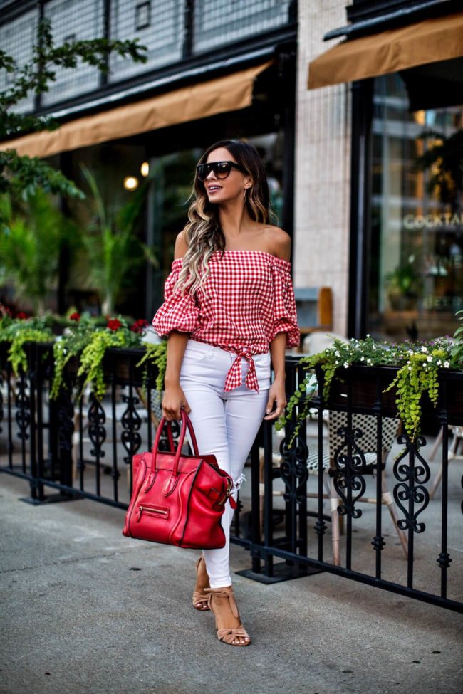 fashion blogger mia mia mine wearing celine sunglasses and red and white gingham print top
