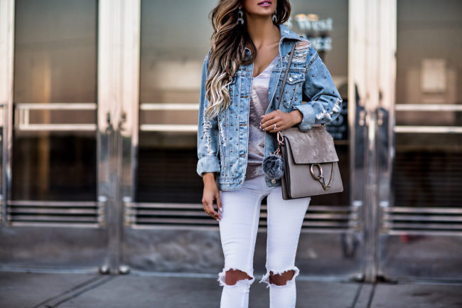 fashion blogger mia mia mine wearing a chloe faye medium bag in motty grey and a topshop denim studded jacket