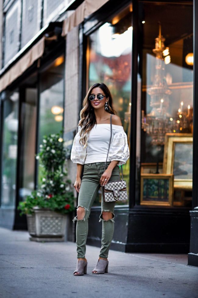 fashion blogger mia mia mine wearing a free people off-the-shoulder top and baublebar earrings for summer