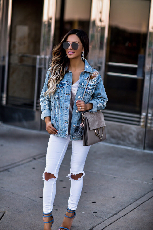 fashion blogger mia mia mine wearing a denim studded jacket from topshop and a chloe faye bag