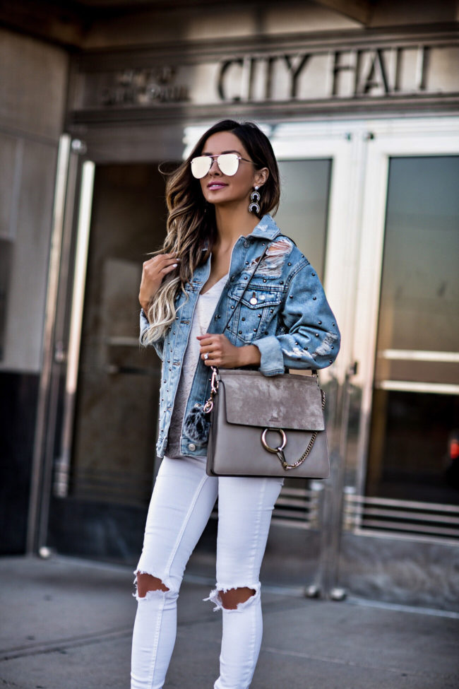 fashion blogger mia mia mine wearing a topshop denim jacket and an H&M silver tank