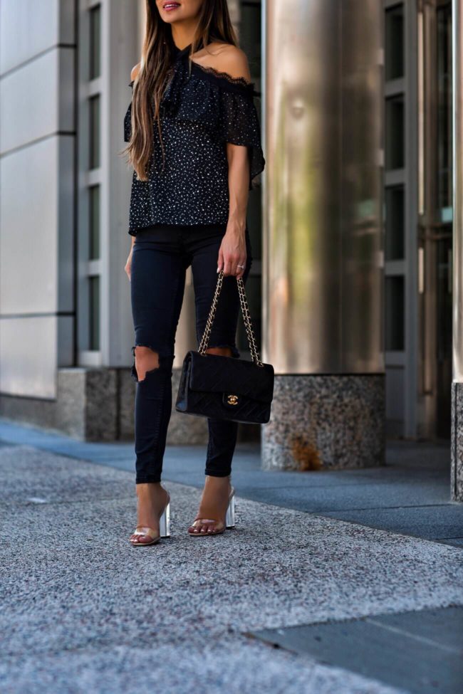 fashion blogger mia mia mine wearing a chanel 2.55 bag and lucite heels