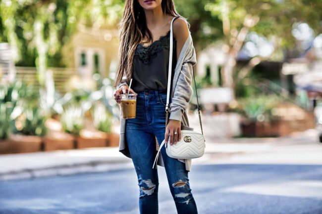 fashion blogger mia mia mine wearing an abercrombie sweater and lace cami