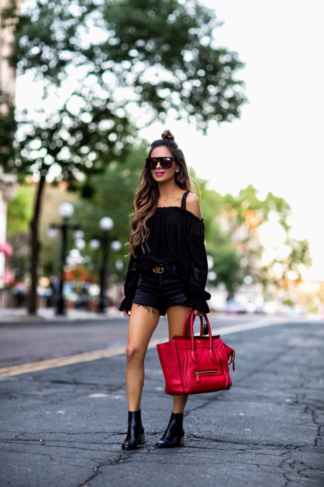 minnesota fashion blogger mia mia mine wearing a cold shoulder top and a red celine bag