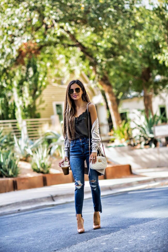 fashion blogger mia mia mine wearing step-hem high-waisted jeans from abercrombie and a gucci marmont mini bag