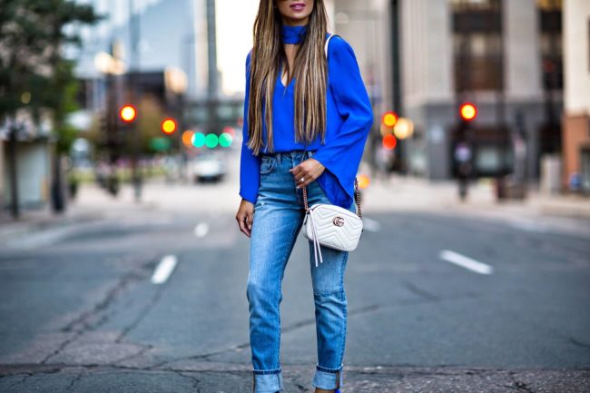 fashion blogger mia mia mine wearing a gucci marmont mini white bag and jimmy choo blue heels