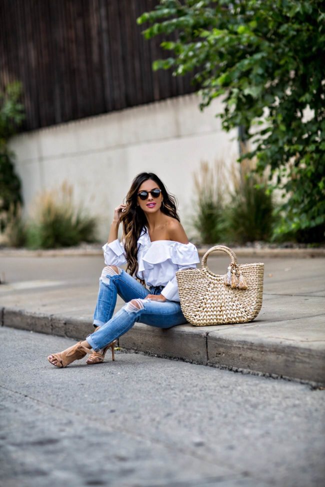 fashion blogger mia mia mine wearing a straw bag and schutz heels