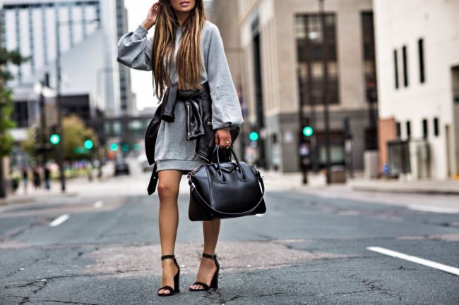 Fashion blogger Mia Mia mine wearing dolce vita studded heels from nordstrom and a leather jacket
