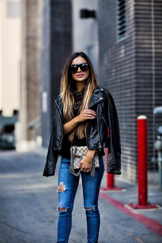 fashion blogger mia mia mine wearing a studded leather jacket by free people