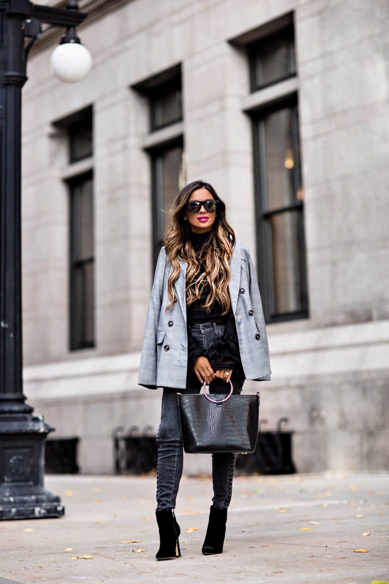 fashion blogger mia mia mine wearing gray plaid blazer and black velvet booties from bloomingdale's