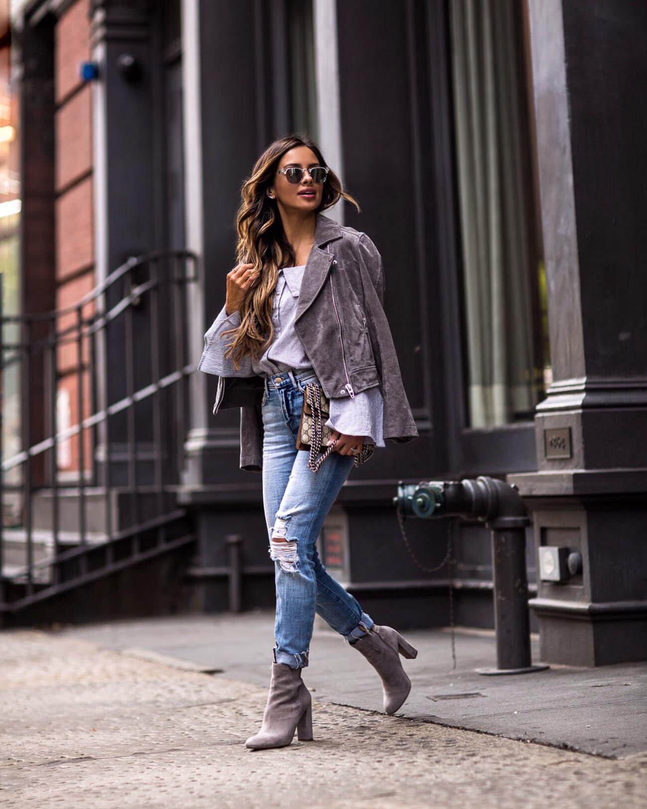 fashion blogger mia mia mine wearing a gray suede jacket from nordstrom in nyc for nyfw