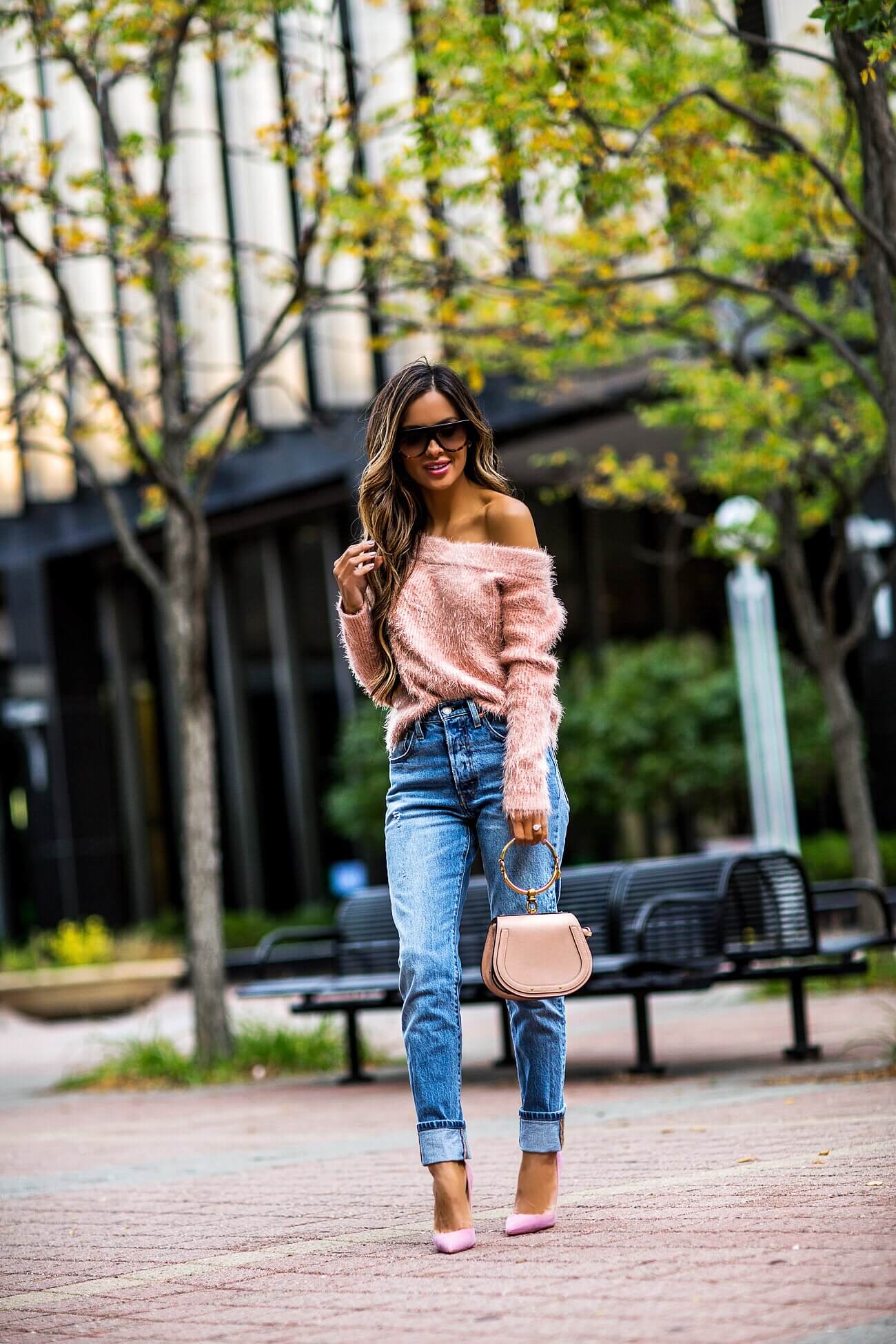 fashion blogger mia mia mine wearing a pink minkpink sweater from shopbop