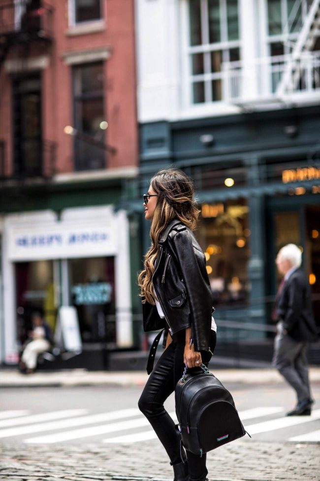 Fashion blogger wearing black leather street style outfit in New York City during fashion week 2017