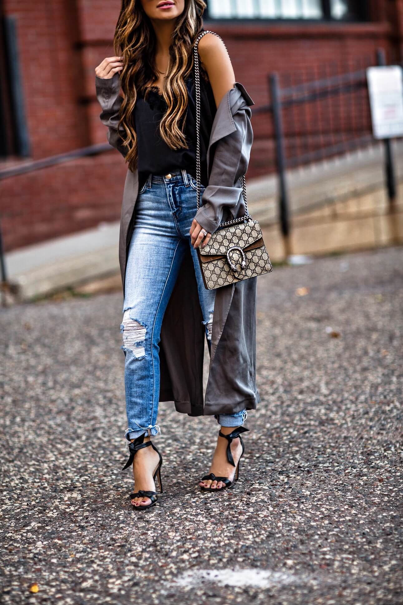 fashion blogger mia mia mine wearing l'agence denim and a gucci dionysus bag