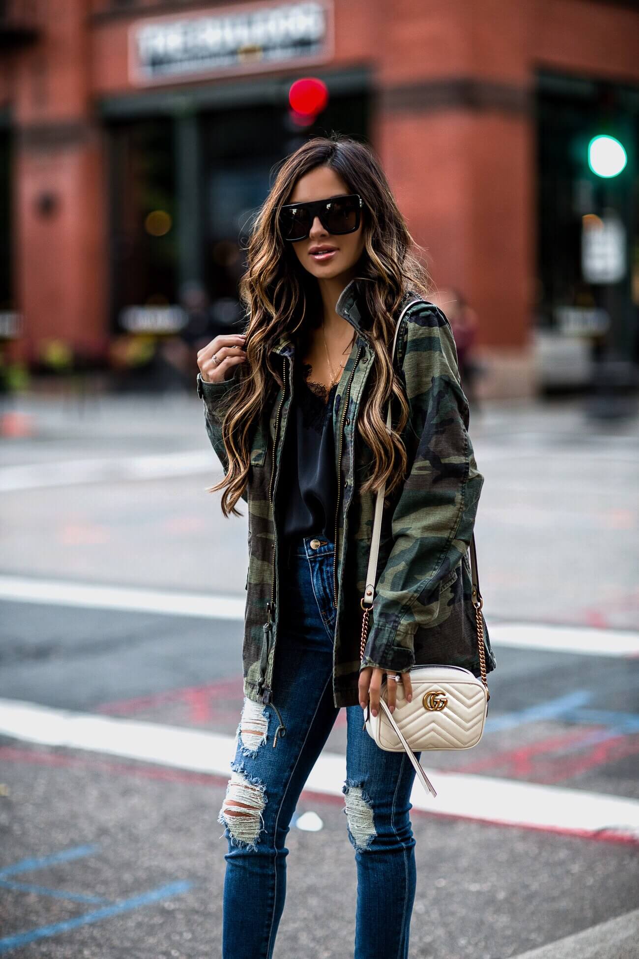 fashion blogger mia mia mine wearing a camo jacket from shopbop and l'agence denim