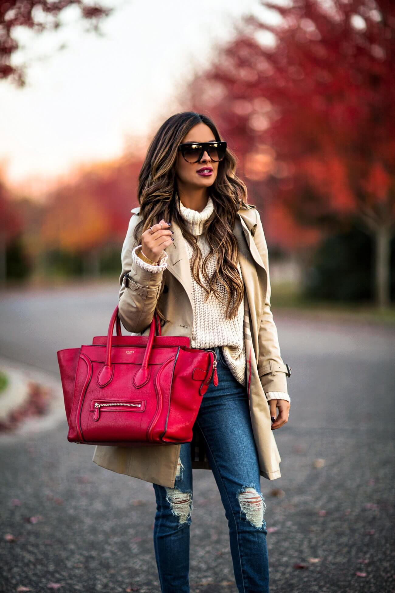 fashion blogger mia mia mine wearing a red celine bag and a burberry trench coat from nordstrom