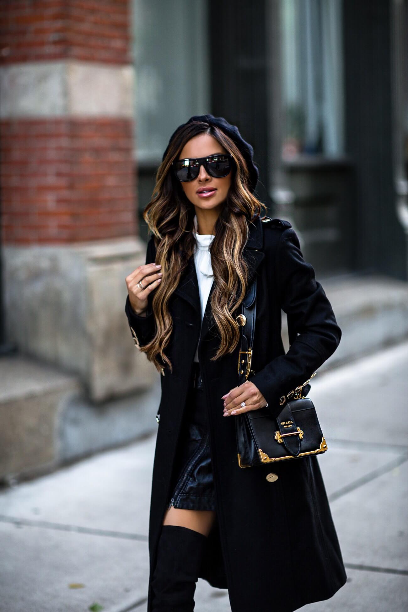 fashion blogger mia mia mine wearing a prada cahier bag and a free people beret