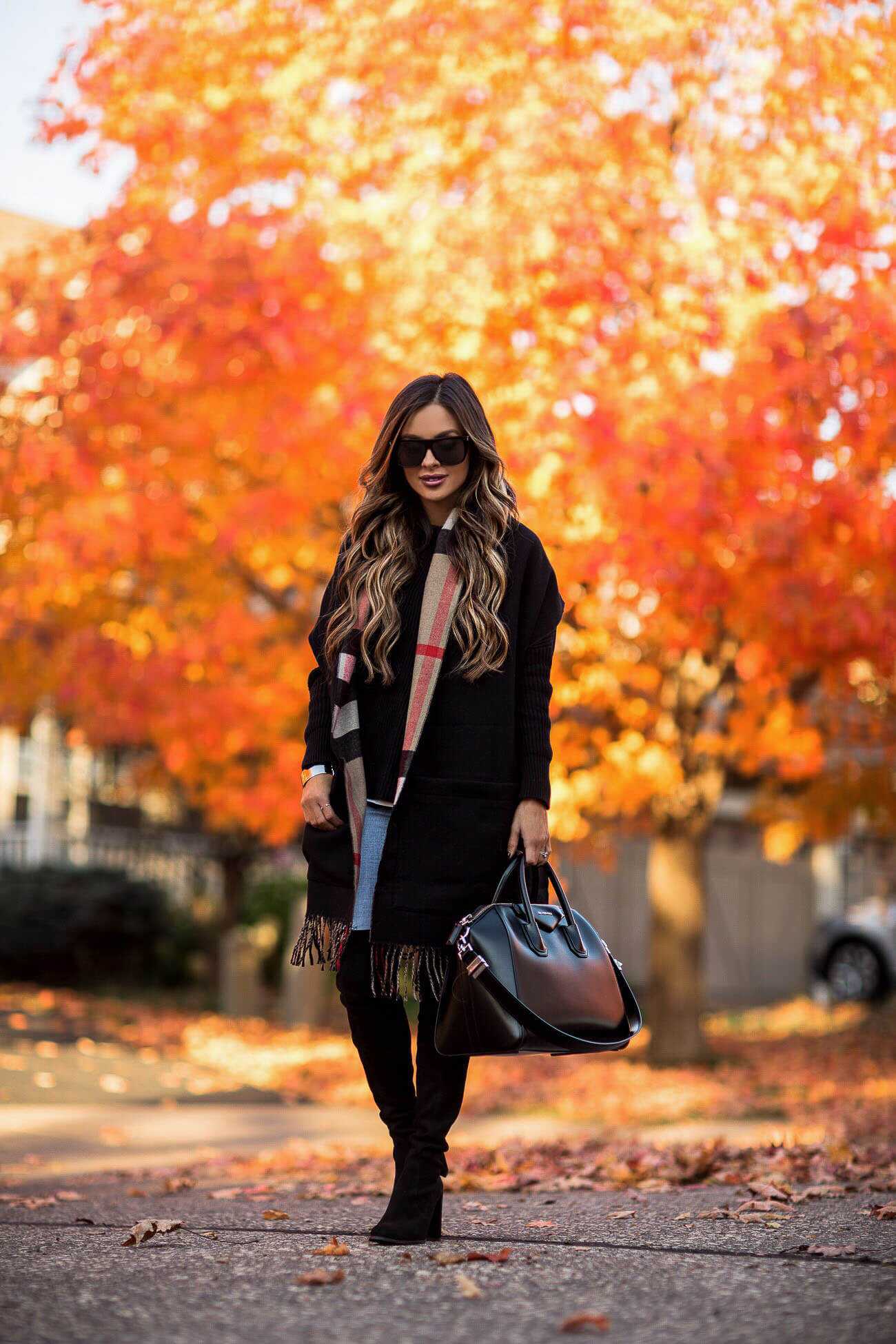 fashion blogger mia mia mine wearing a burberry scarf and givenchy bag