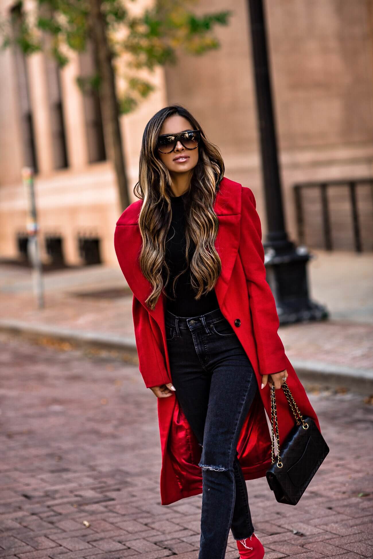 mia mia mine wearing a red kendall + kylie coat from bloomingdale's and a chanel bag