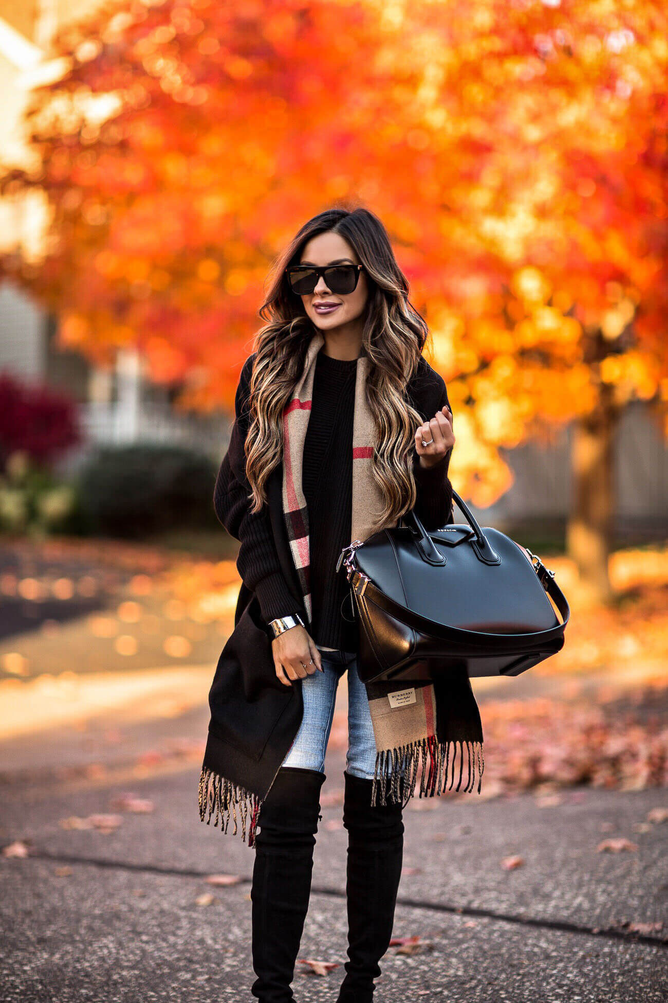 fashion blogger mia mia mine wearing a burberry scarf with pockets