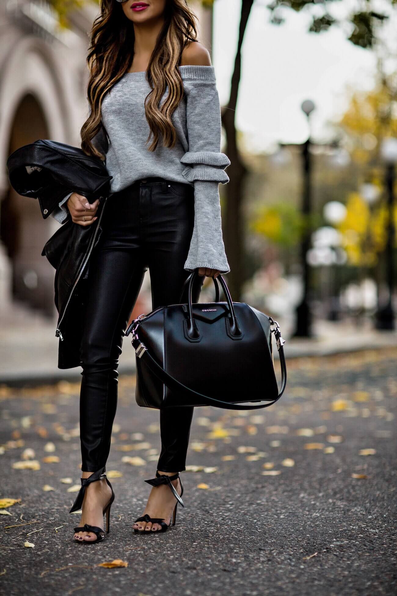 fashion blogger mia mia mine wearing a givenchy antigona bag and a faux leather pants from shopbop