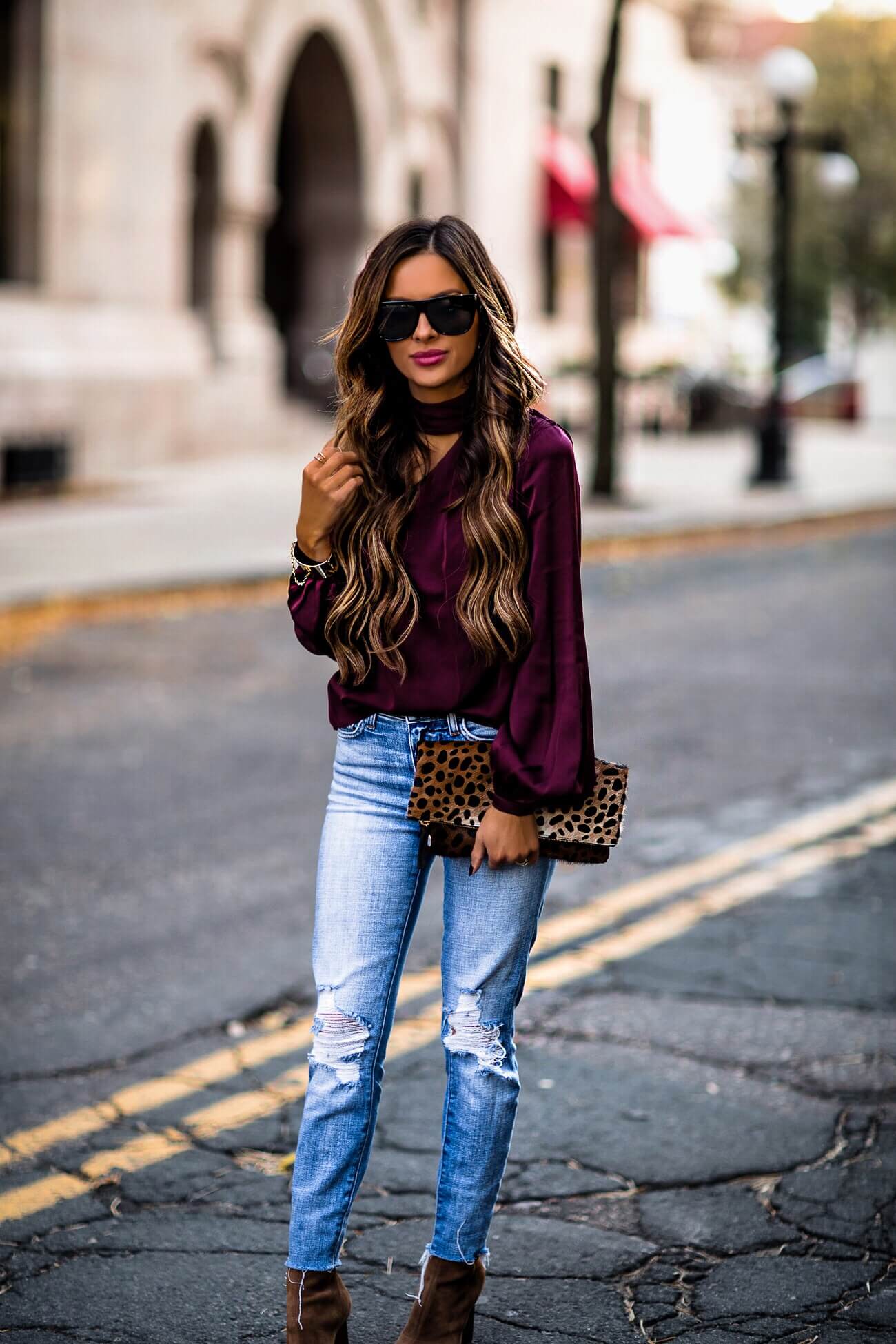 fashion blogger mia mia mine wearing a purple top from intermix and l'agence denim