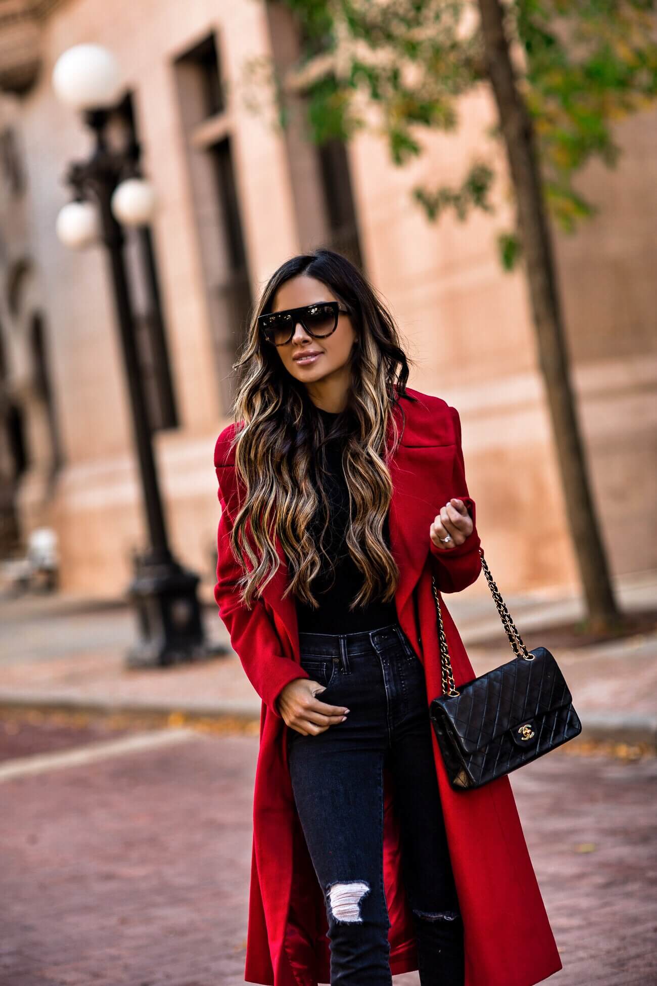 fashion blogger mia mia mine wearing a red coat and red booties from bloomingdale's