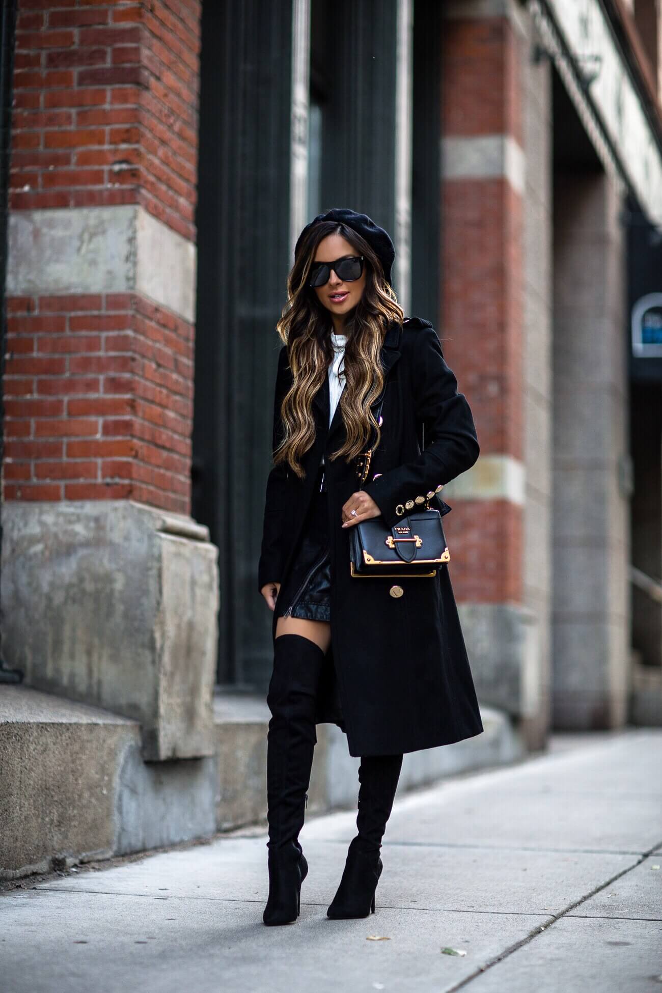 fashion blogger mia mia mine wearing a prada cahier bag and kendall + kylie over the knee boots