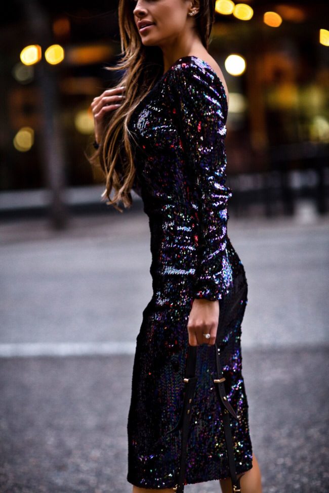 fashion blogger mia mia mine wearing a holiday sequin dress from nordstrom