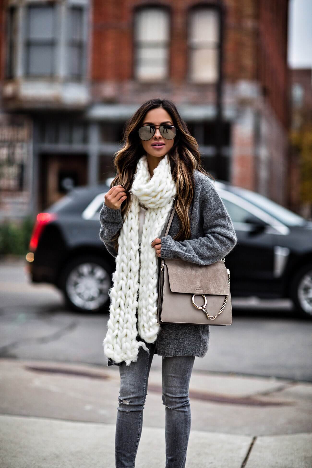 fashion blogger mia mia mine wearing a gray sweater from H&M