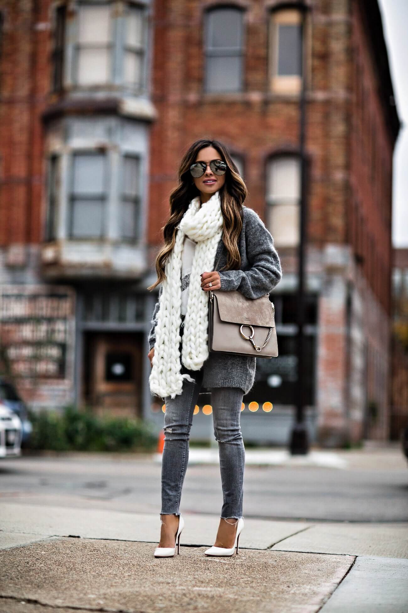 fashion blogger mia mia mine wearing a chloe faye bag and an H&M gray cardigan