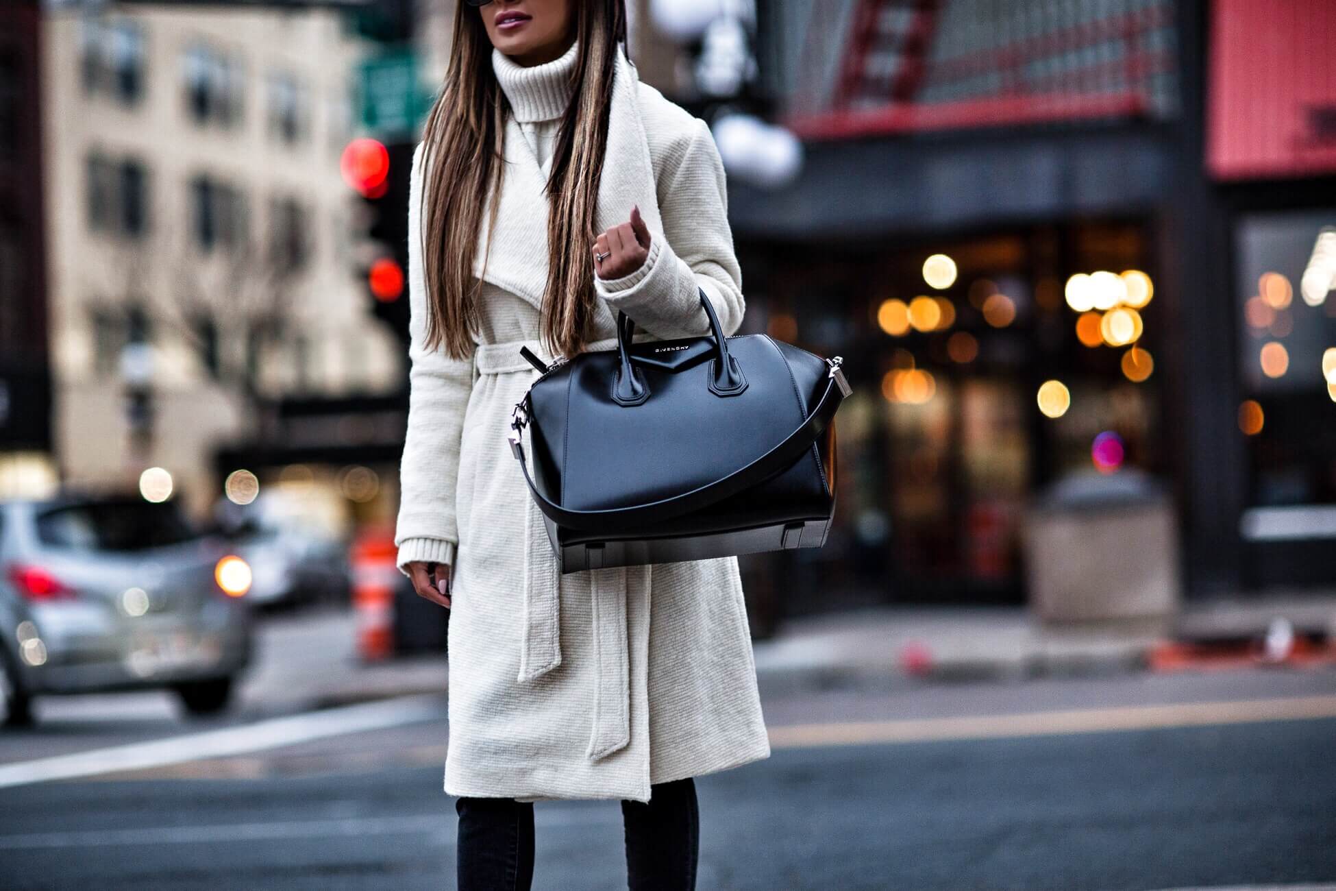 fashion blogger mia mia mine wearing a white coat from shopbop and a givenchy antigona bag