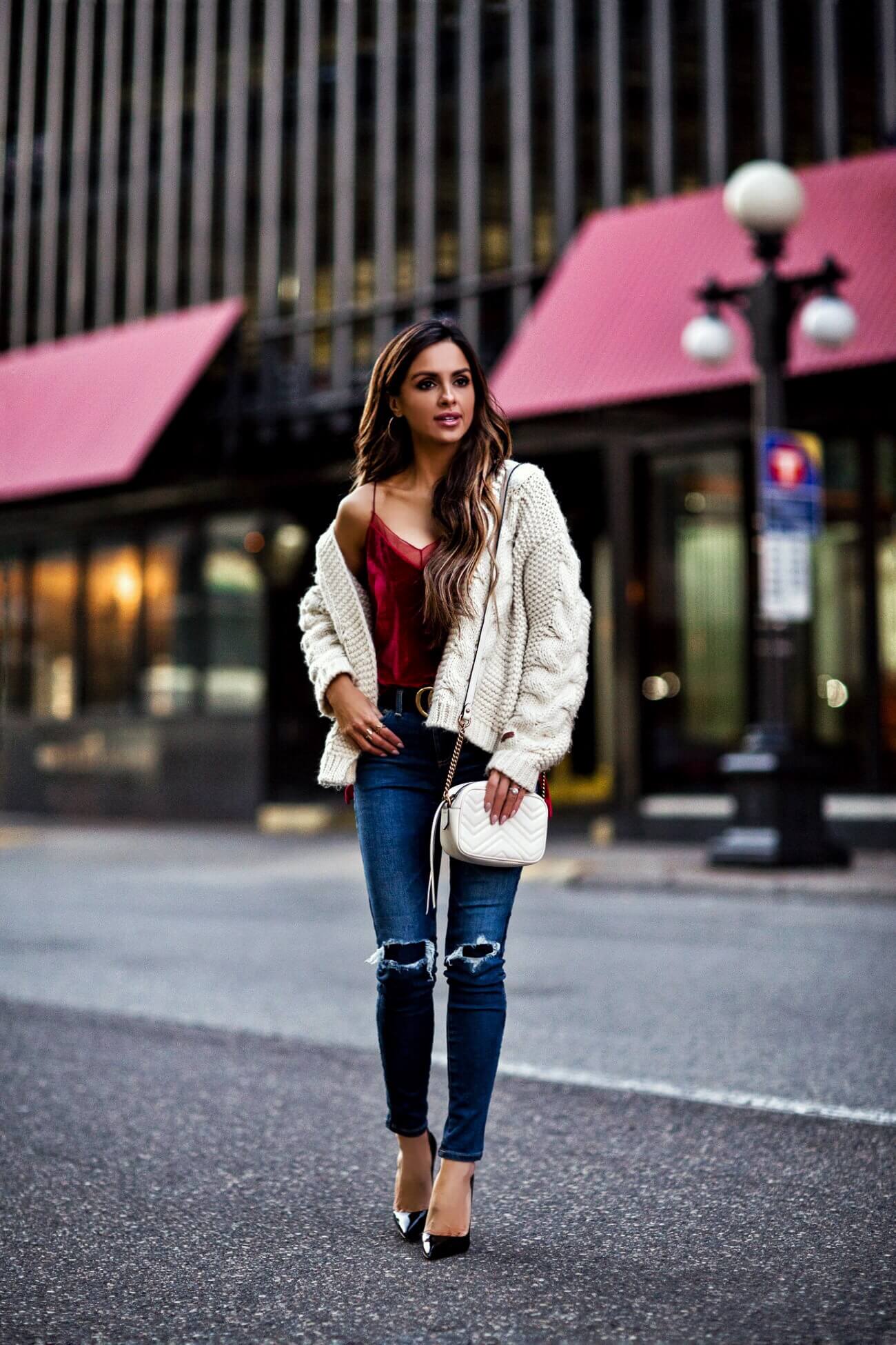 fashion blogger mia mia mine wearing a red velvet cami and a gucci marmont bag