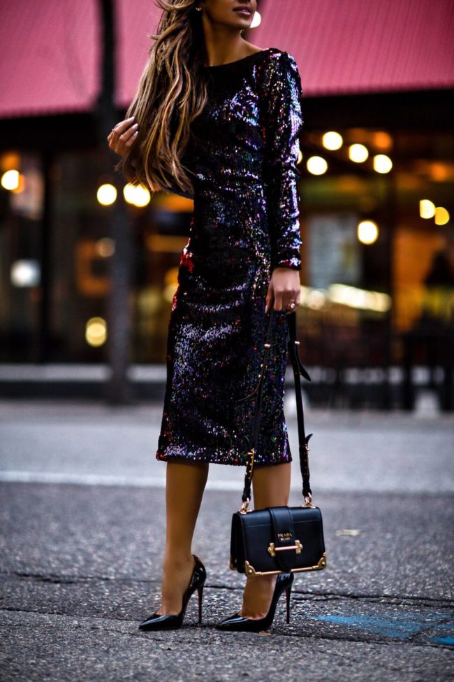 fashion blogger mia mia mine wearing a sequin holiday dress from nordstrom