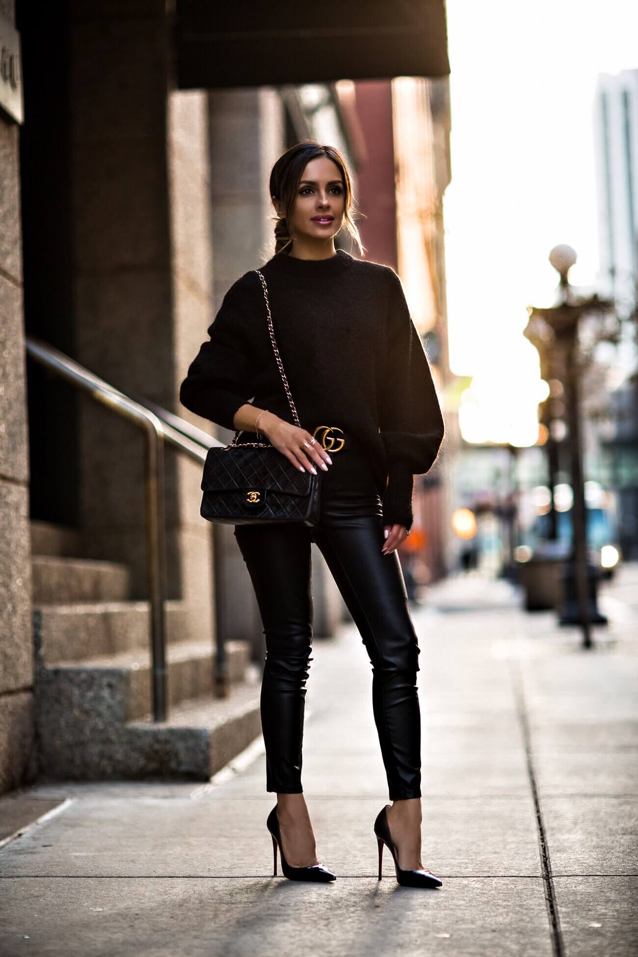 fashion blogger mia mia mine wearing a black sweater from H&M and aurate jewelry