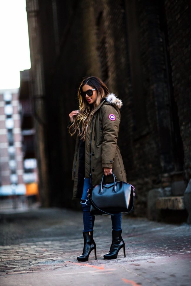 fashion blogger mia mia mine wearing a canada goose jacket from elevtd