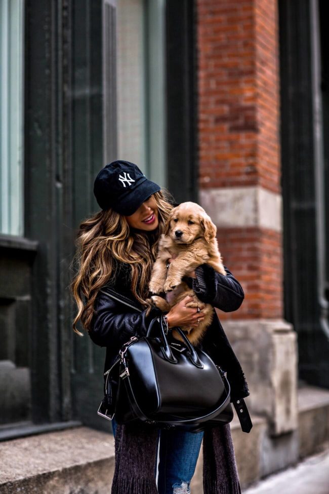 fashion blogger mia mia mine wearing a H&M biker jacket and a givenchy antigona bag