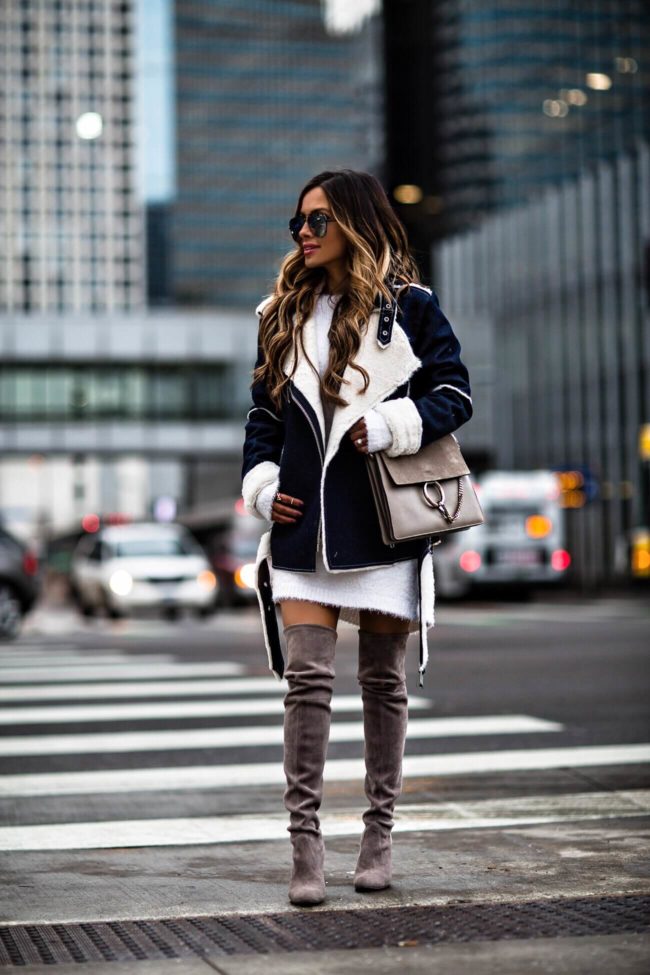 fashion blogger mia mia mine wearing a chloe faye bag and a joa biker jacket