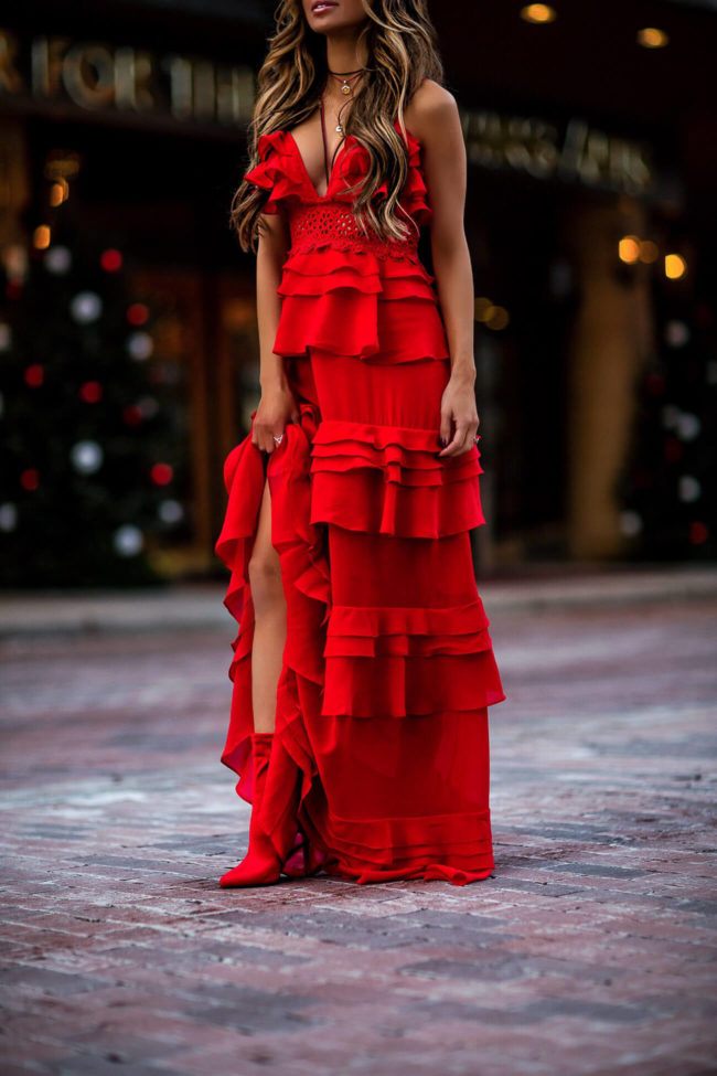 fashion blogger mia mia mine wearing a red dress and red steve madden red booties