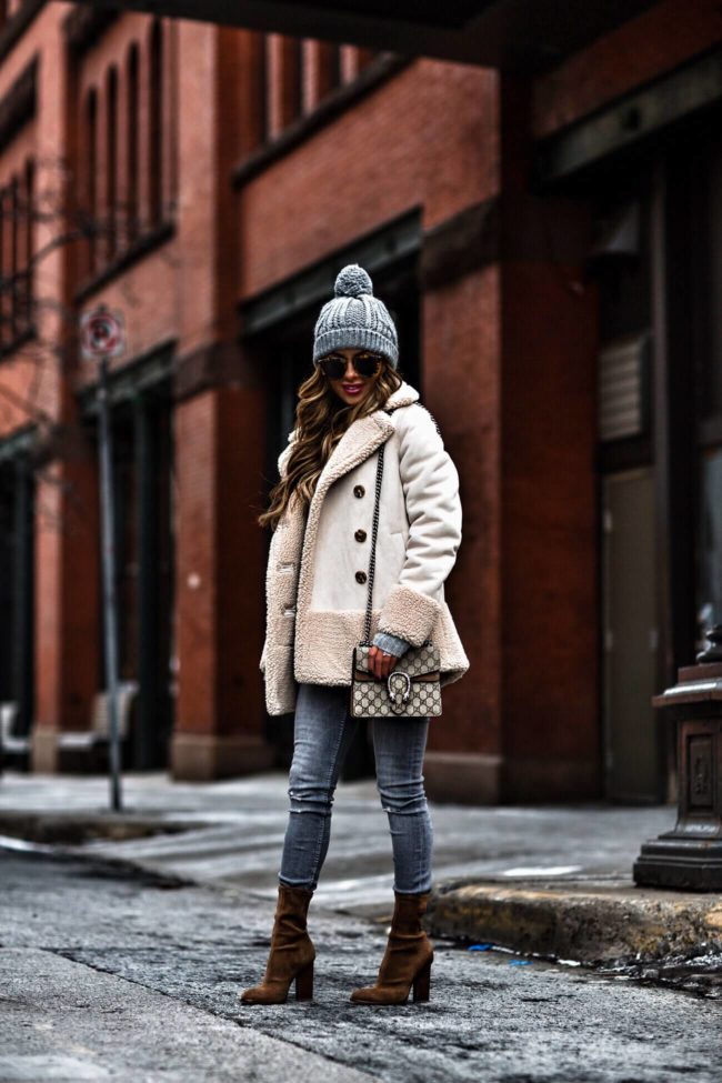 fashion blogger mia mia mine wearing a sherpa jacket by mother