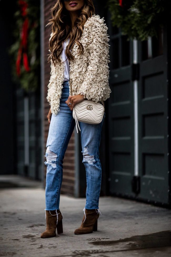 fashion blogger mia mia mine wearing a shag jacket and l'agence denim and alexander wang booties