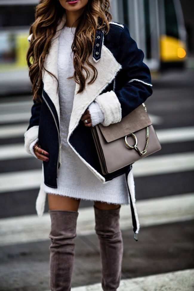 fashion blogger mia mia mine wearing a chloe faye medium bag and a denim biker jacket by j.o.a.
