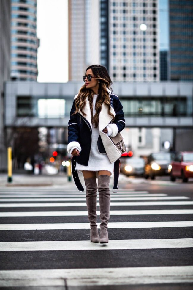 fashion blogger mia mia mine wearing stuart weitzman over-the-knee boots and a chloe faye bag