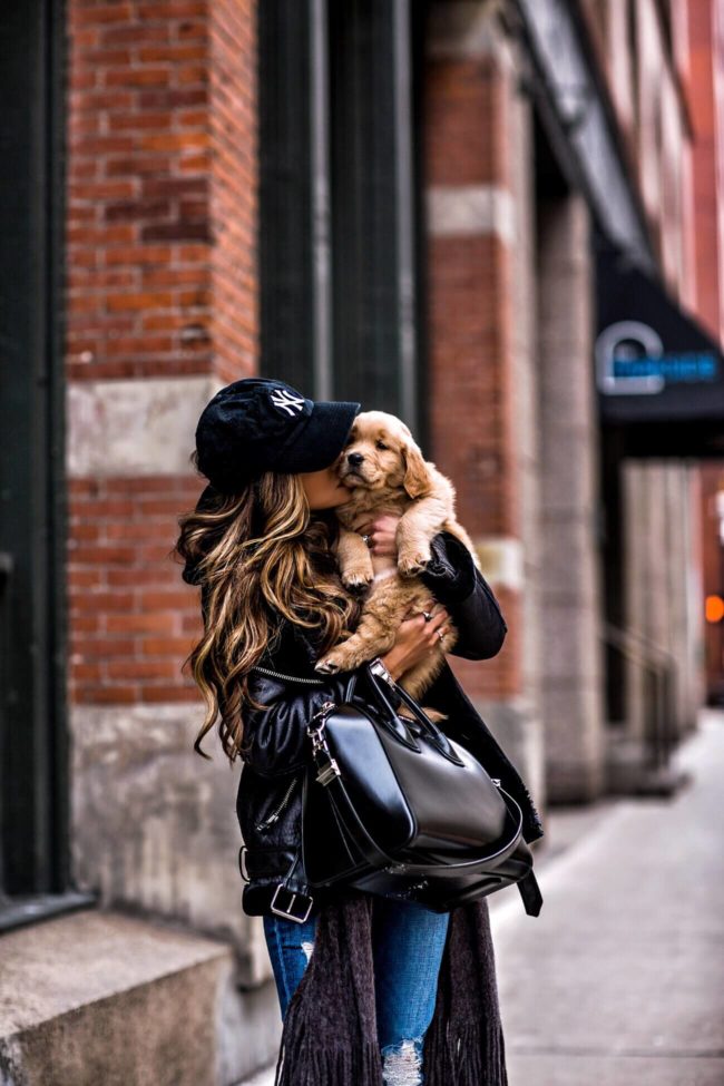 fashion blogger mia mia mine wearing a givenchy bag on sale with golden retriever puppy leo