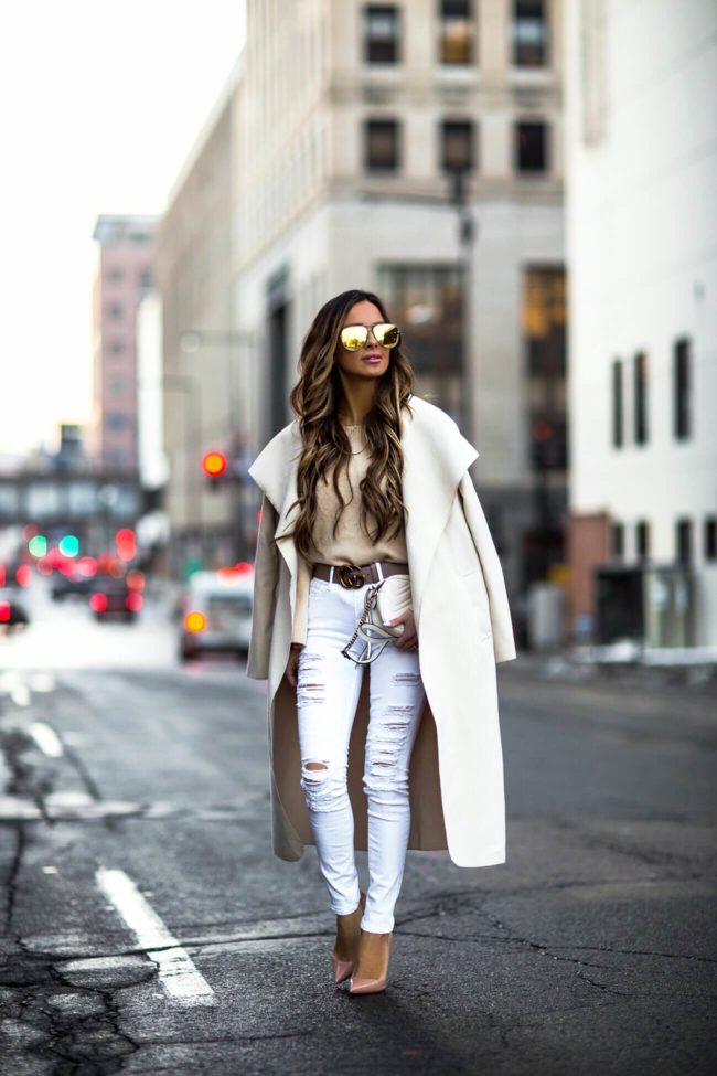 fashion blogger mia mia mine wearing a neutral winter outfit from revolve