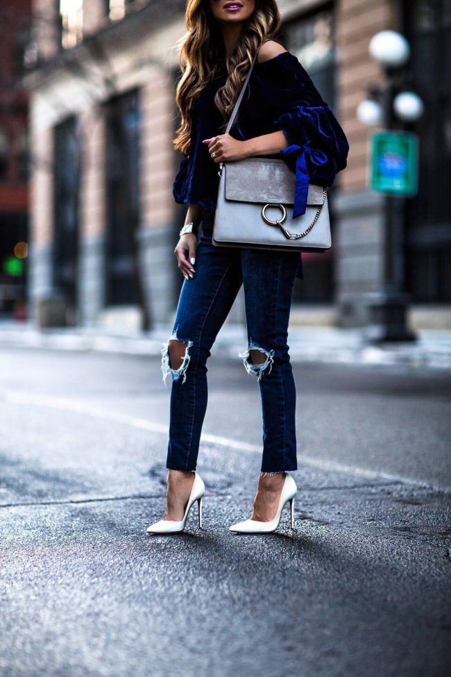 fashion blogger mia mia mine wearing a chloe faye bag and white louboutin heels