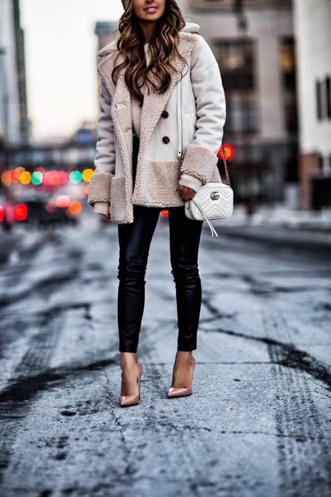 fashion blogger mia mia mine wearing christian louboutin so kate heels and leather leggings from shopbop