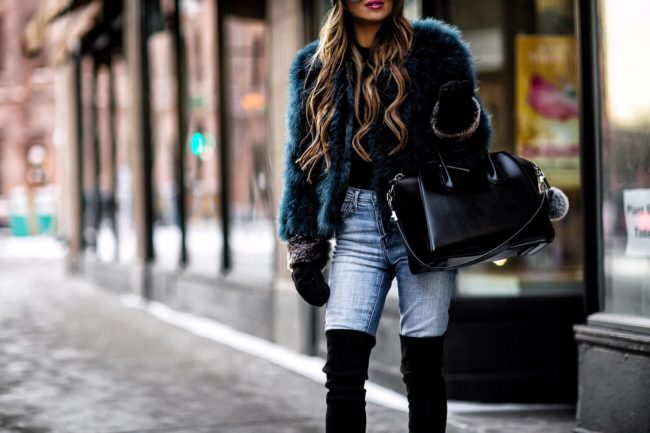 fashion blogger mia mia mine wearing a faux fur jacket